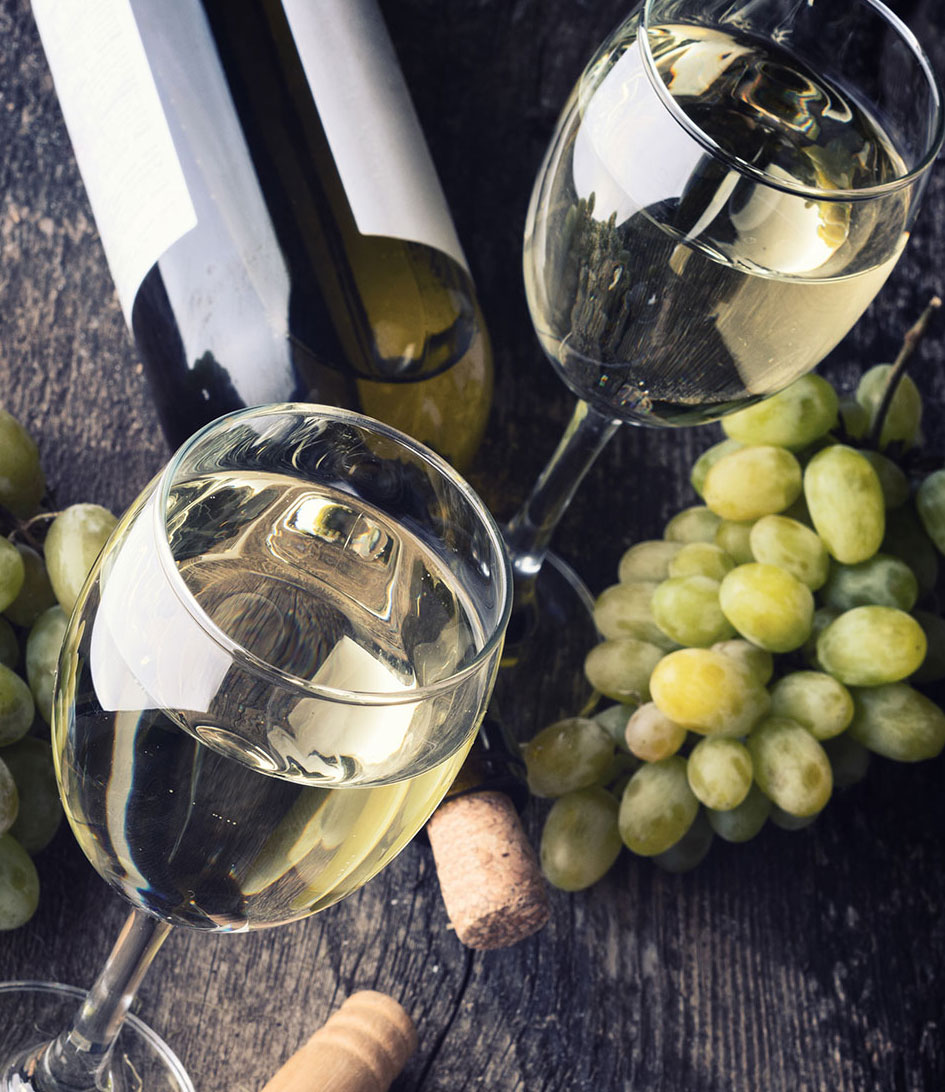 Glasses of Tokaji aszú in warm light